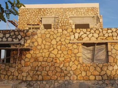 CONSTRUCTION TECHNIQUES FOR BUILDING BUILDER STONE WALLS